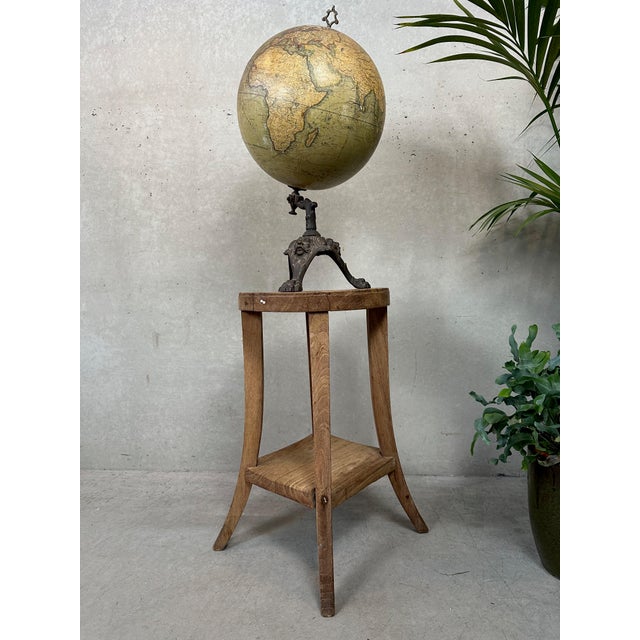 Round, brutalist side table in solid wood. Handcrafted with mortise and tenon joints, there's some play between the legs....