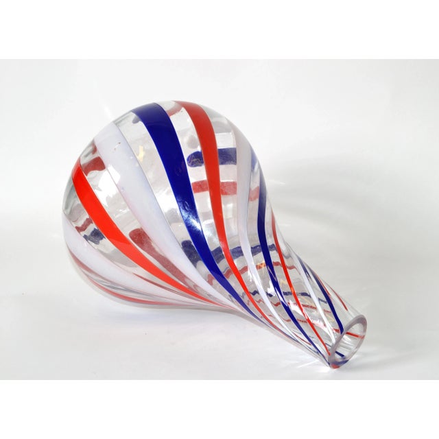 Labeled Italian Blown Murano Vase in a candy swirl design motif of Red, White, Blue & Clear coloring. Marked with Silver...