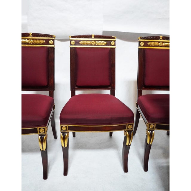 Set of 4 Mid 20th Century Empire Style Chairs **We have 16 total. Selling them as set of four This exquisite pair of...