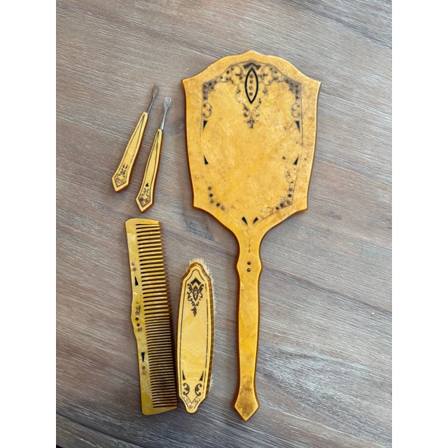 Stylish Art Deco (5) piece celluloid vanity set of grooming implements perfect for a vanity or dresser top. The grouping...