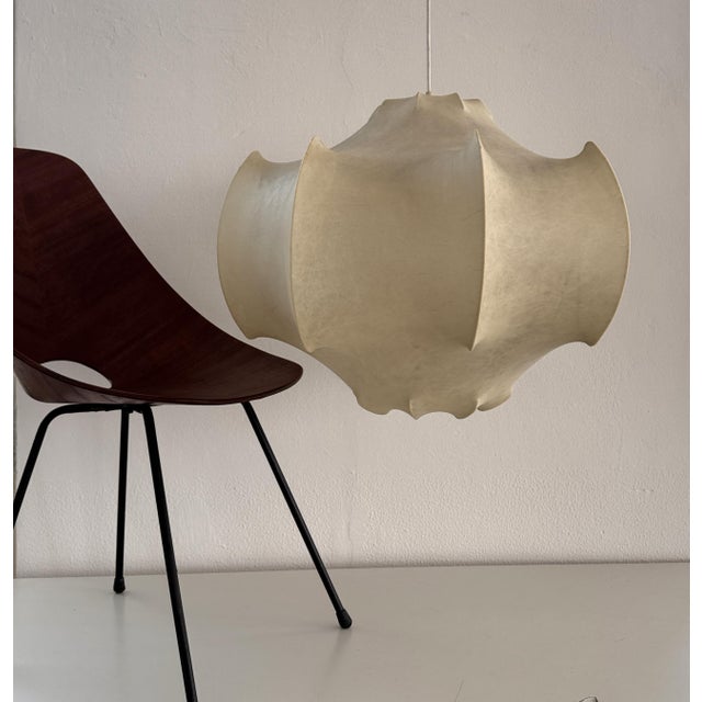 Stunning "Viscontea" vintage pendant light of the early editions. Designed by Achille and Pier Giacomo Castiglioni, Italy,...