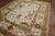 A One of a kind Turkish Oushak rug with olive accent colors on an ivory ground woven with angora wool Measures: 8'2'' x...