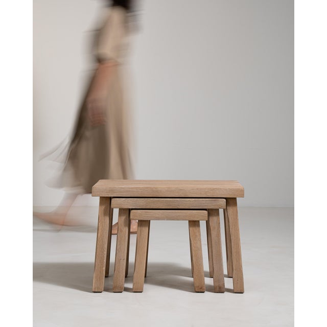 A practical set of nesting tables featuring bold Brutalist styling. The tiered design allows for flexibility while...