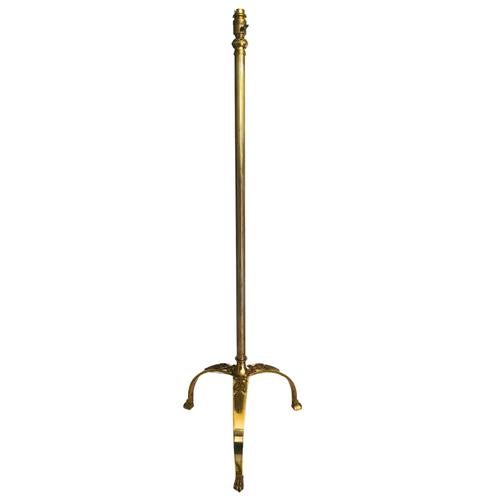 Rare and elegant French tall, bronze floor lamp with a sleek, neoclassical design. The lamp’s base consists of three...