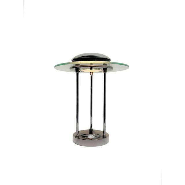 A beautiful Robert Sonneman “Saturn” table lamp from the 1980s, designed for Boxford. It works perfectly, is dimmable, and...