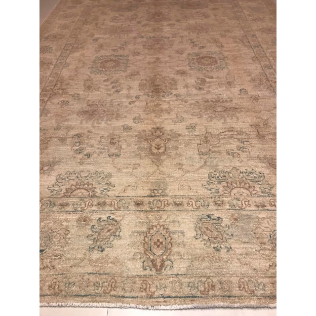 This artisanal product was hand knitted in wool on a cotton frame.