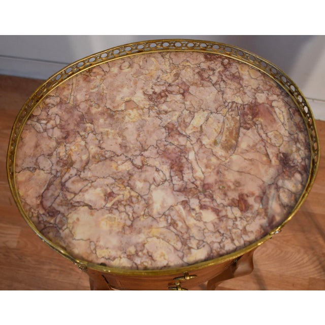 We are pleased to offer this beautiful Antique pair of French Louis XV Nightstands, from the 1880s. This pair is made of...