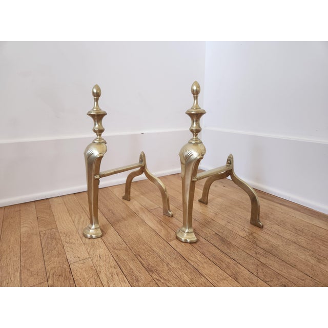 This is a beautiful pair of brass andirons. They were recently polished. They are small but very sturdy. Perfect for a...