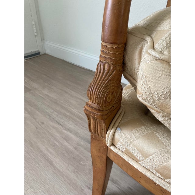 High Quaility and sturdy solid wood empire style arm chair with carved dolphin armrests. Has a yellow/tan diamond textured...
