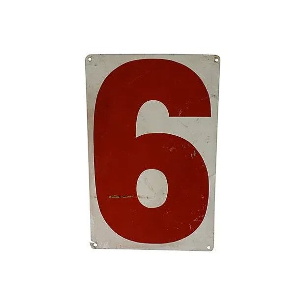 Vintage red and white aluminum gas station number 8 with 6 on reverse. Wear, scratches, holes where attached, tear on corner
