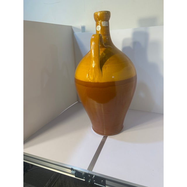 Add authentic Mediterranean grandeur to your interior with this exceptional, vintage 24-inch Italian terracotta floor urn....