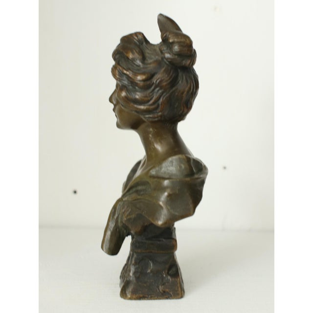 Patinated bronze bust titled "Carmen", modelled by French sculptor Emmanuel Villanis (1858-1914), circa 1900. Signed "E....