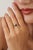 This solitaire ring features a 1.07 carat octagon cut blue sapphire set in 14K yellow gold. The sapphire measuring 5 x 6.5...