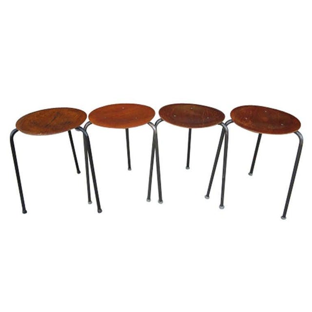Super sleek design, signature mark of Tony Paul. Each has a tripod base with circular table surface.