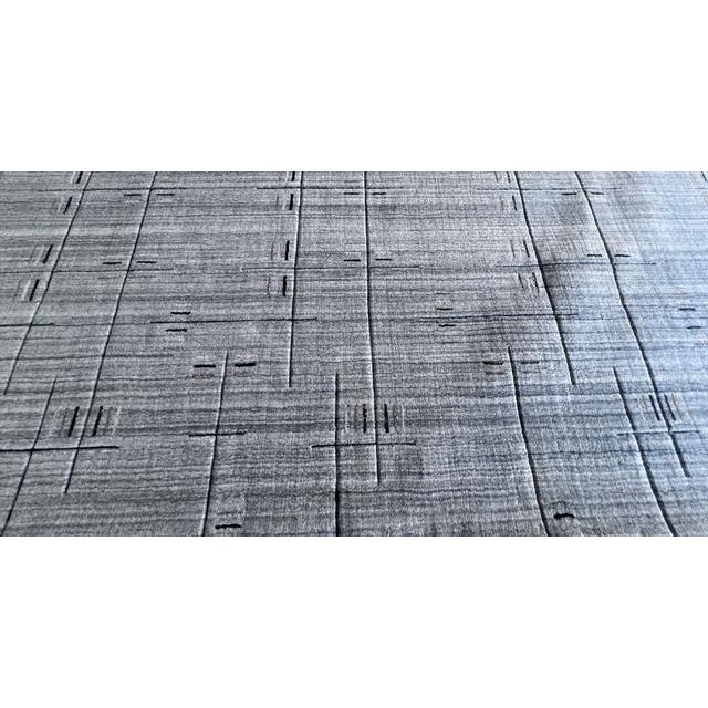 This unique and innovative modern design rug is an eye catching example that beautifully showcases some of the stunning...