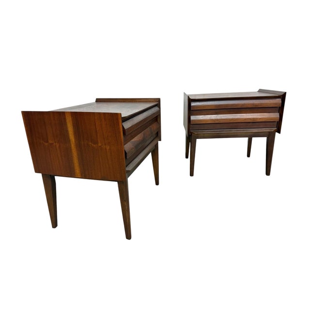 Elevate your bedroom with this stunning pair of Lane 1st Edition walnut nightstands, beautifully refinished to highlight...