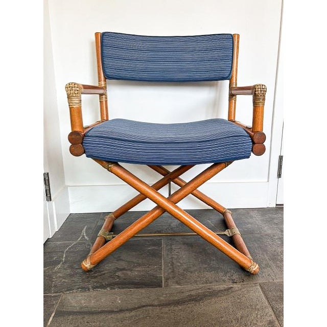 This fun, mid-century set of four director chairs is an easy way to add vintage flair to your home. The chairs are made...