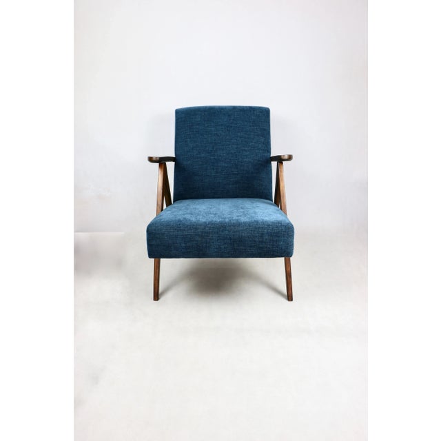 Vintage classic armchair in grey and blue jeans style. A classic vintage armchair, very similar to the Var B-310 model...