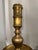 Elevate your space with this spectacular pair of monumental 49.5-inch vintage Moroccan solid brass floor candlesticks....