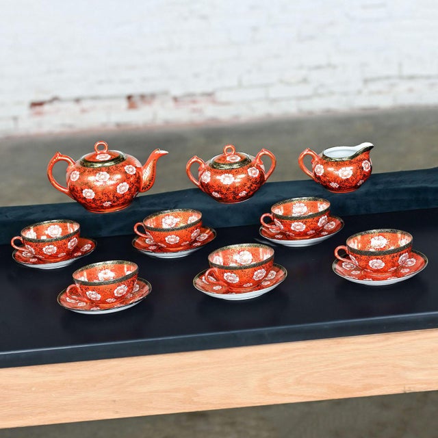 Gorgeous vintage Oriental Chinese red & gold hand painted porcelain tea set marked “Made in Japan.” Set includes 1 tea pot...