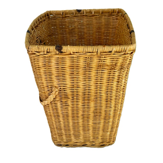 A unique basket made of rattan cane with "freckles". The freckles are not imperfections, rather they signal authenticity...