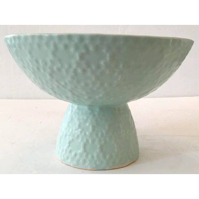 Very nice raised cache pot bowl in matte mint ceramic with a drain hole at the base. Decorate it with a small flower or...