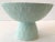 Very nice raised cache pot bowl in matte mint ceramic with a drain hole at the base. Decorate it with a small flower or...