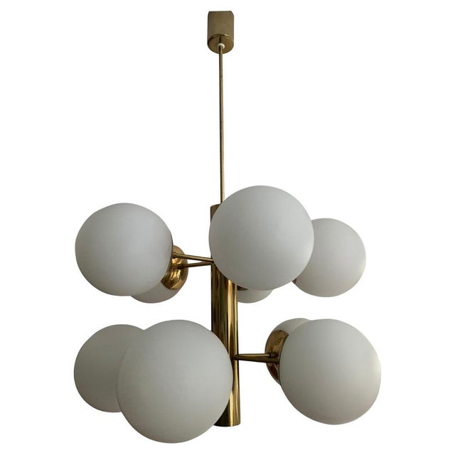 Stylish Sputnik chandelier. This two-tier, 10-arm version is considered rare. It provides bright light and beautifully...