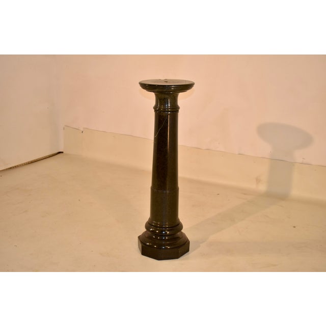 English Edwardian Marble Pedestal, circa 1900. This is a beautiful marble pedestal in a rich dark green color. The marble...