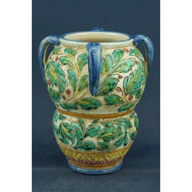 Item : Glazed majolica vase, hand-crafted on a wheel and entirely hand-decorated with scratched floral decorations, with...