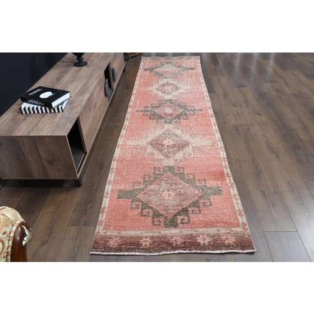 Vintage Turkish Hand-Knotted vintage rug is a semi-antique vintage area rug.'70s Eastern region of Turkey's unique rug is...