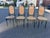 Set of 4 Thonet style dining chairs with cane seating and back rest. Dimensions: H: 43.5” W: 17” D: 17” SH: 18.5” SW: 16”...