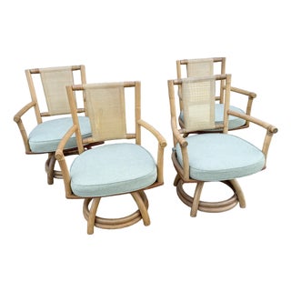 Boho Chic Rattan Cane Back Swivel Dining Arm Chairs - Set of 4 For Sale