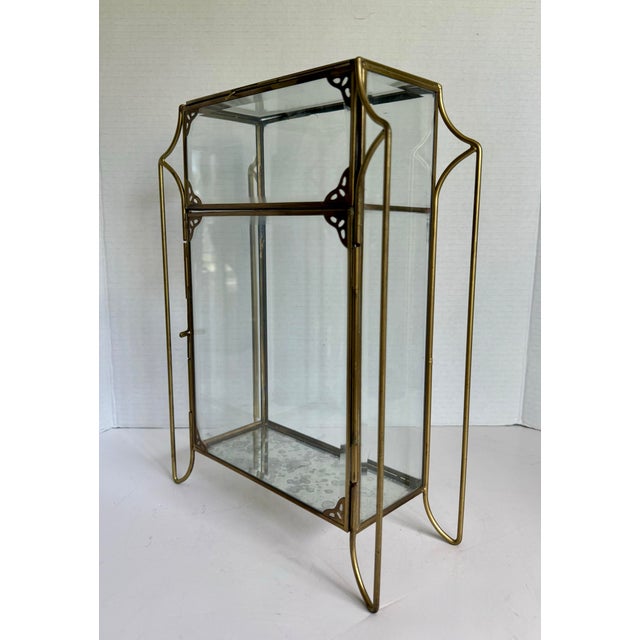 Vintage Brass & Glass Vitrine With Sculptural Side Supports & Antiqued Mirror Base For Sale - Image 12 of 12