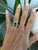 A chrome tourmaline blazes in vivid, saturated green at the center of this solid two-tone 14K white and yellow gold ring,...