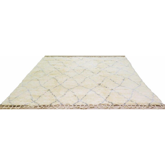 Moroccan Modern Hand-knotted with care using traditional rug-making techniques, this wool rug blends timeless...