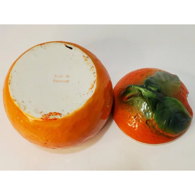 This is a beautiful example of German porcelain. You can see in the shading of the leaves that the hand painting was...