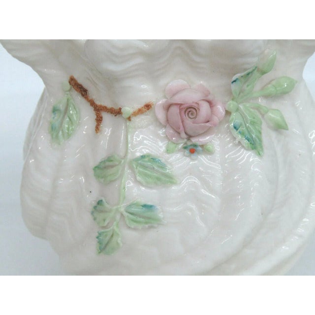 This gorgeous Vase is made of porcelain. This beautiful piece was made in Ireland by Belleek, the fine porcelain company,...