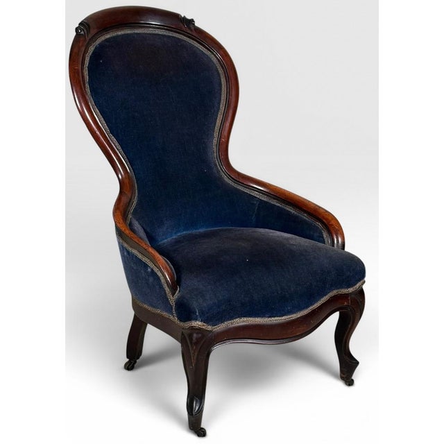 Antique Victorian Walnut Rococo Revival Navy Velvet Parlor Chair This striking nineteenth-century Victorian ladies' parlor...