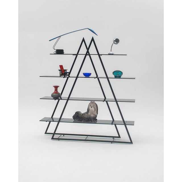 Metal and smoked glass shelving unit from the 1970s in the shape of an overlapping triangle.