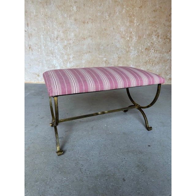 This elegant Spanish gilt iron bench was recently made by skilled European artisans using traditional iron working...