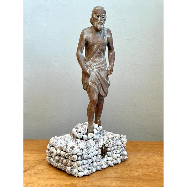 This vintage wood and shell figure box presents a striking juxtaposition of hand-carved classical sculpture and...