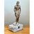 This vintage wood and shell figure box presents a striking juxtaposition of hand-carved classical sculpture and...