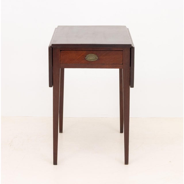 George III Mahogany Pembroke Table, with single drawer. Open: 28.75" H x 36.5" W x 31" D; closed: 28.75" H x 19.25" W x...