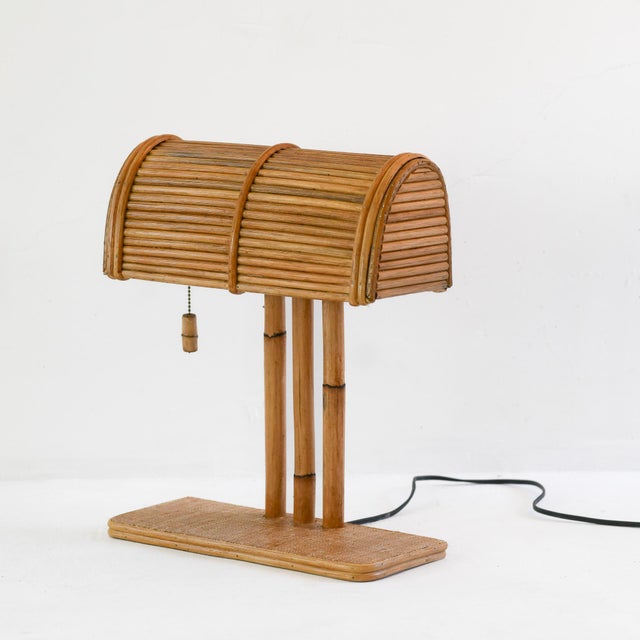 Rattan Modern BP Desk lamp This unique desk lamp blends the warmth of natural materials with the sleek lines of art deco....