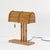 Rattan Modern BP Desk lamp This unique desk lamp blends the warmth of natural materials with the sleek lines of art deco....