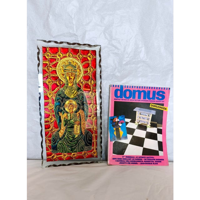 Made in Italy, 1970s. This beautiful panel is made in hammered and engraved glass with a painted sacred image. The glass...