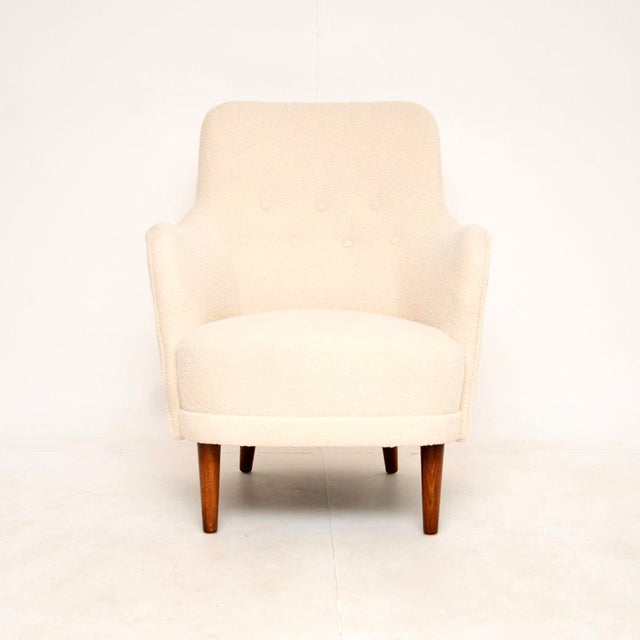A stylish and iconic vintage Swedish Samsas armchair by Carl Malmsten. It was made in Sweden, it dates from around the...