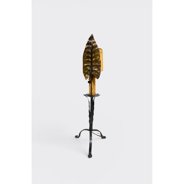 Minimalist Antique 1920s tall wrought iron base with tin brass leaf table lamp. There is so many design details and...