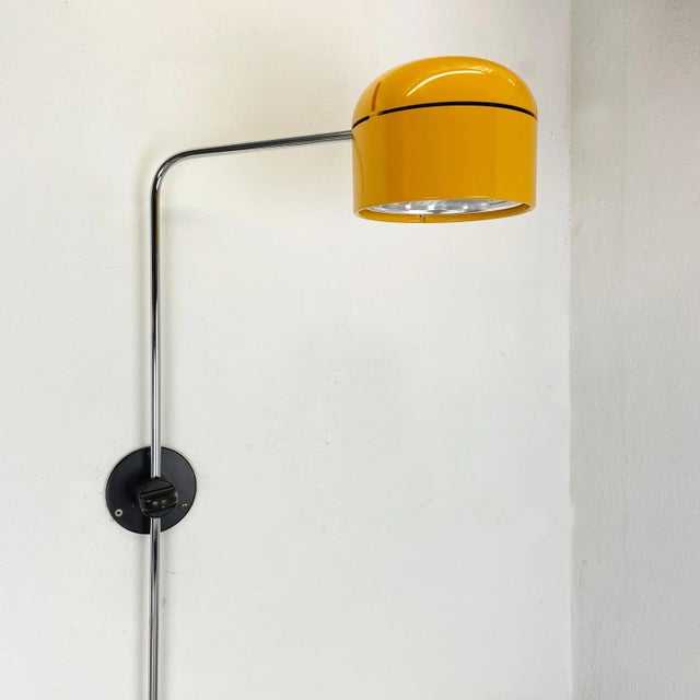 Yellow adjustable wall light Producer: Staff Lights, Germany (see label inside the shade) Age: 1970s This extraordinary...